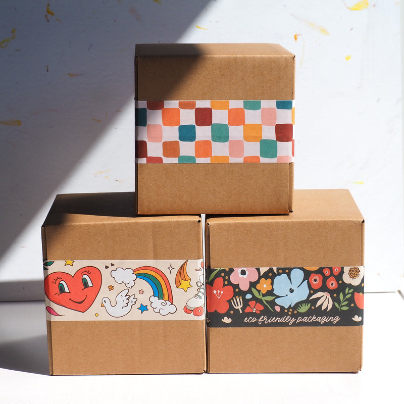 3 boxes with cute water activated packing tape 